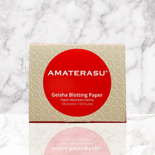 A compact package of Amaterasu Geisha Blotting Paper with 100 sheets.